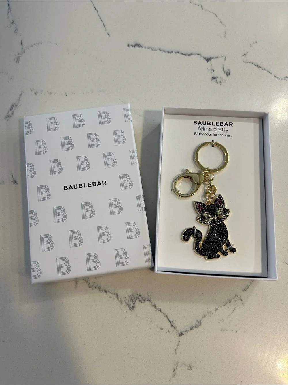 BaubleBar Black Glitter Cat Keychain with Gold Hardware